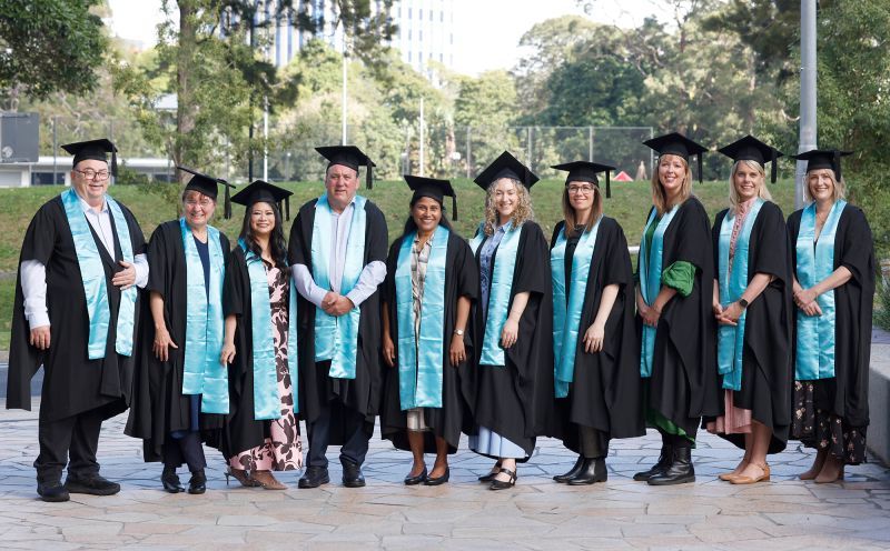 2026-grad-students-outside.jpg