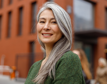mature asian woman wellbeing